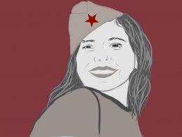 Lächelnde Frau mit Hut und Sternabzeichen - Eine Partisanin
